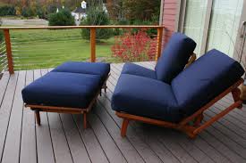 An Outdoor Loveseat And Ottoman That Is Made Up Of 3 Armless Outdoor Chairbeds Outdoor Loveseat Outdoor Furniture Sets Outdoor Deck Furniture