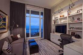 Home Office And Tv Room Combo Is A Practical And Ergonomic Choice Decoist Living Room Office Combo Small Tv Room Home Office Guest Room Combo