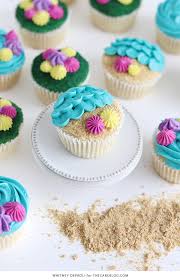 Sprinkle white cupcakes generously with crushed vanilla wafers to resemble sand; Beach Cupcakes The Cake Blog