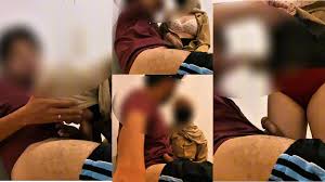 อมควยโดยครูแขกลูกเสือฮิญาบในห้องปฏิบัติการโรงเรียน