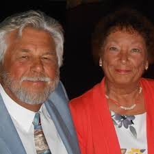 Where is the best place to watch big fishing boats come in for the evening  in Oregon Inlet or Pirate's Cove?