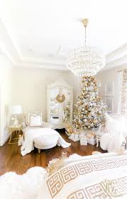 I also love decorating my bed with greens. Elegant White And Gold Christmas Bedroom Tour Randi Garrett Design