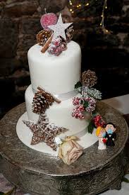 An ivory silk chiffon grecian wedding gown, this design is perfect for the bride who wants to feel like a true goddess on her wedding day. A Small Festive Wedding At Christmas Time Weddingsonline