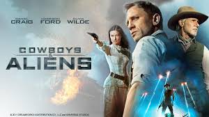 It may be generic and not make sense at times, but I still really enjoy  Cowboys and Aliens (2011). I saw it in theaters with my brother and dad  back in 2011