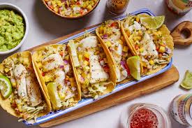 The combination of spicy fish and fabulous cool cole slaw is such an easy and perfect pairing! Halibut Fish Tacos With Cilantro Slaw