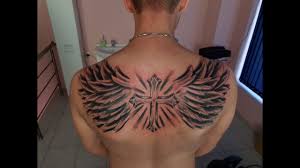 Angel wings lower back tattoos. Tattoo On Back Wings And Cross Timewaps How To Tattoo Youtube