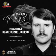 Police Officer Duane Johnson was shot and killed by a robbery suspect in  Chinatown at about 2:00 pm. Officer Johnson and his partner had responded  to the jewelry store in the report