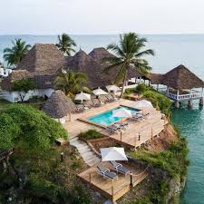 Chuini Zanzibar Beach Lodge With A Private Beach Overlooking The Bay Chuini Zanzibar Beach Lodge Is Located 12 Km North Beach Lodging Zanzibar Beaches Zanzibar