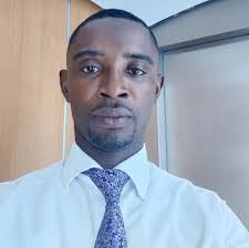 Hon. Mrs Justina Marigold Assan