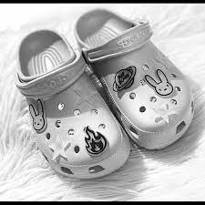 The singer and the footwear brand have partnered on a pair of classic clogs that. Crocs Shoes Jibbitz Croc Charms X Bad Bunny Poshmark