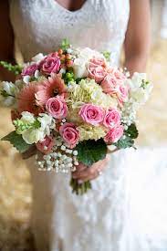 Before you say ew to faux florals from the dollar store, think again. Pink Rose And Gerbera Daisy Bridal Bouquet