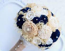 Maybe you would like to learn more about one of these? Dieser Handgefertigte Brautstrauss Aus Gold Und Marine Ist Mit Sola Holzmamas Gefarbt Die Navy Blue Wedding Bouquets Bridal Bouquet Blue Gold Wedding Bouquets