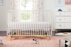 Elevate Your Modern Nursery Style With The Mid Century Modern Bixby Convertible Metal Crib Combining Materials With An Ai Metal Crib Cribs Baby Room Furniture