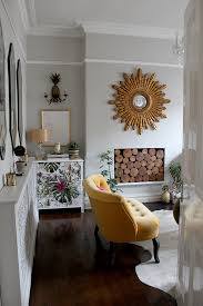 Turn your living room into a boho glam wonderland. Gold Starburst Mirror Wallpaper Chest Of Drawers Yellow Boho Glam Living Room Style 650x975 Wallpaper Teahub Io