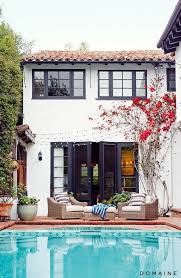 Exterior Paint Color Trends We Re Head Over Heels In Love With Spanish Style Homes House Exterior House Colors