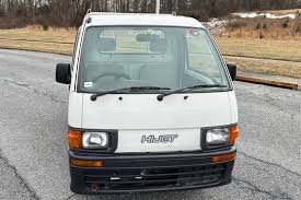 Image result for Shooting White 1964 Daihatsu