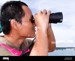 Uses binoculars hi-res stock photography and images