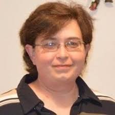 Christy England Obituary