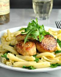 Heat 2 tablespoons olive oil in a cast iron skillet over high heat just until smoking. Seared Scallops With Pasta Pinch And Swirl