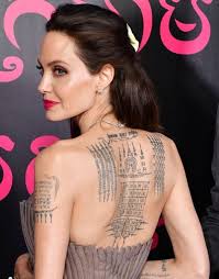 This rune styled tattoo which is on her wrist is actually a letter h. 21 Exquisite Angelina Jolie Tattoos With Meanings 2021 From Old Designs To The New Cover Ups Tattoosboygirl