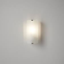 Use our wall lamps to illuminate shadowy corners, to embrace your bed with a soft glow or add them as a pop of visual interest to a blank wall. White Porcelain Effect Wall Light Diy At B Q