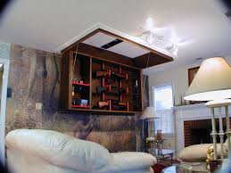 Some gun owners hide their firearms inside the wall, in the gun vault, while some hide it inside their closet, cabinet, shelf, and in their safe room. Secret Ceiling Gun Storage And Display Stashvault Secret Stash Compartments