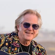 Explore the life and iconic recordings of guitarist Timothy Kain