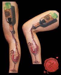 11 More Awesome Wine Tattoos Wine Tattoo Wine Tattoos Bottle Tattoo