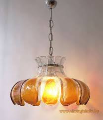 Large hurricane style lamp with attractive floral pattern and solid base with decorative carvings. Av Mazzega Amber Glass Flower Pendant Lamp Vintageinfo All About Vintage Lighting