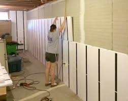 To finish basement walls, you'll need to prepare the walls first, install insulation, apply a wall frame, and install drywall before you can decorate them. Finishing Basement Walls Without Drywall Basement