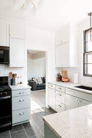 This layout leaves plenty of cabinet space between appliances and really opens up the kitchen. Our Diy Modern Kitchen Renovation These Days