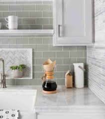 The green vitralite is so overwhelming — even though we're used to it. Backsplash Tile The Tile Shop