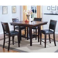 Defined as casually elegant, the espresso cherry finish adds depth and character to this truly transitional piece. Claremont Fulton 5 Piece Counter Height Set With Lazy Susan Nebraska Furniture Mart