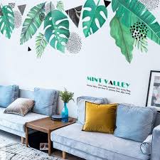 Our giant tree with falling leaves wall decal is one of our most popular tree decals! Large Tropical Leaf Wall Sticker Nature Planting Decal Vinyl Etsy In 2021 Wall Sticker Simple Wall Decor Tropical Leaves