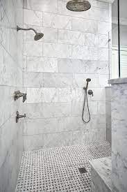 In This Beautiful Walk In Zero Entry Master Bathroom Shower The Walls Are 12x24 Honed Whi Master Bathroom Shower Small Bathroom Tiles Bathroom Remodel Shower