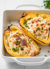 Chicken Alfredo Spaghetti Squash Low Carb Keto In Half On A Plate Chicken Alfredo Sauce Recipe Keto Cooking Keto Recipes Easy