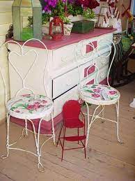 Find the perfect ice cream chair stock photo. Vintage Iron Ice Cream Parlor Chairs Upcycled Vintage Wallpaper Red Flowers French Bistro Chairs Parlor Chair Shabby Chic Furniture Metal Bistro Chairs