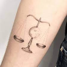 Sometimes a man is holding the scales, and he is balancing them with the center of the scale on his fingers. 36 Best Libra Tattoo Designs And What They Mean Saved Tattoo