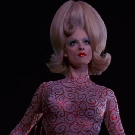 Lisa Marie’s iconic “Martian Girl” in MARS ATTACKS! 🎬was completely silent  by design. She trained for weeks to perfect that eerie, floating movement  inspired by dancers and pantomime. Her giant white ...