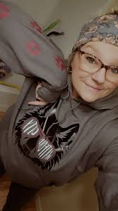 Another customer has been CAUGHT wearing one of our hoodies out in public!  She got to snag a FREE beanie just for wearing our brand in public. You can  get caught too…our