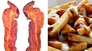 Poutine is essentially potato french fries topped with cheddar cheese curds and smothered in thick brown gravy. Canadian Food The Most Canadian Foods Include Bacon Poutine And Maple Syrup Huffpost Canada Life