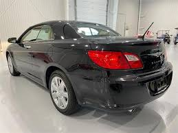 Image result for Brilliant Black 2010 Sebring