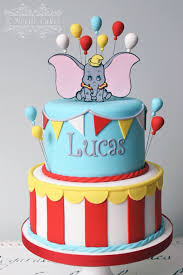 Dumbo Theme Birthday Cake By K Noelle Cakes Carnival Birthday Cakes Dumbo Birthday Party Boys First Birthday Cake