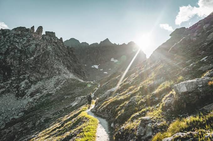A quiet mountain trail away from the crowds, AI generated