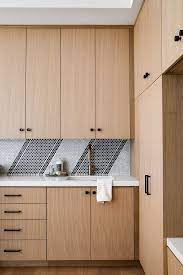 How about honed black granite, or brown or. Rift White Oak Flat Faced Cabinet In Rift White Oak Rift White Oak Rift White Oak Rift White Oak White Oak Kitchen Wood Kitchen Cabinets Laundry Room Cabinets