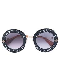 Gucci Eyewear L Aveugle Par Amour Sunglasses Farfetch In 2020 Gucci Eyewear Gucci Sunglasses Round Eyewear