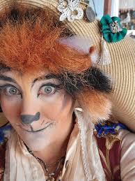 People having fun with statues.