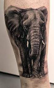 Elefantes Simbolismo Y Los 70 Mejores Tatuajes Realistic Elephant Tattoo Elephant Tattoo Ideas Elephant Tattoo Design