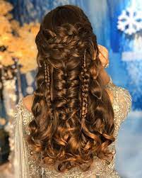 Best Hairstyle For A Wedding Mehndi And Haldi With Floral Hair Styles Hairstyle Fishtail Braid Hairstyles