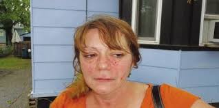 Woman charged with hate crime after allegedly threatening police officer